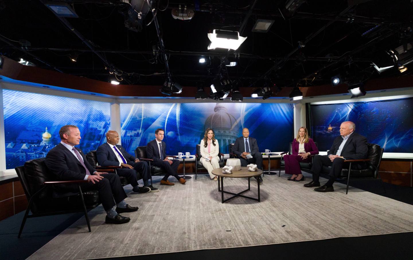 From left, New Jersey Rep. Josh Gottheimer; Newark Mayor Ras Baraka; Jersey City Mayor Steve Fulop; moderator NJ Spotlight News anchor Briana Vannozzi; moderator WNYC Morning Edition host Michael Hill; New Jersey Rep. Mikie Sherrill; and former state Senate President Steve Sweeney attend the New Jersey Democratic gubernatorial primary debate Monday, May 12, 2025, in Newark, N.J.